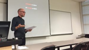 Photograph of Andrew Dilts, presenting a lecture at Rowan University, Feb. 2017